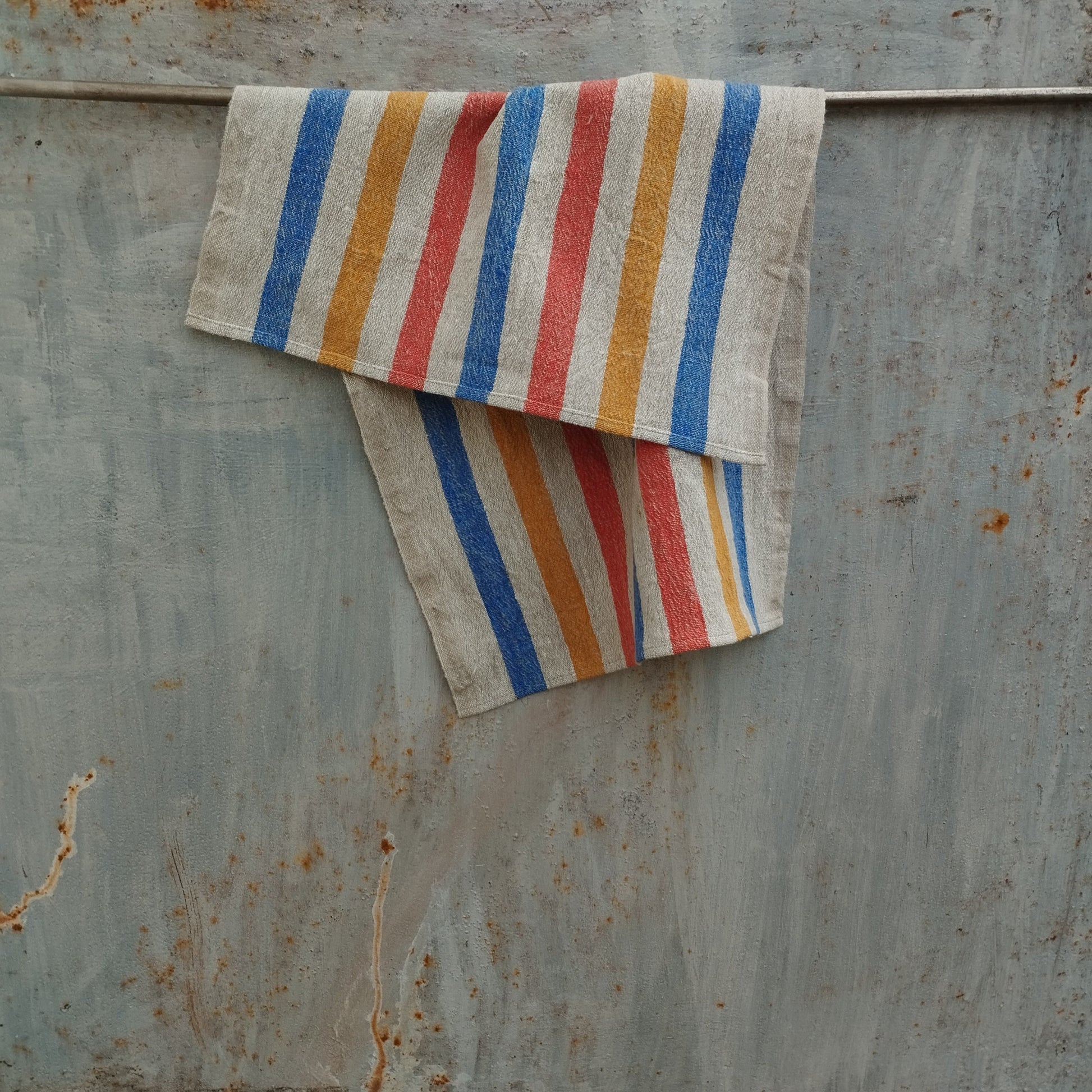 colorfyl linen towel in grain sack weave made of european linen
in yellow red blue stripes